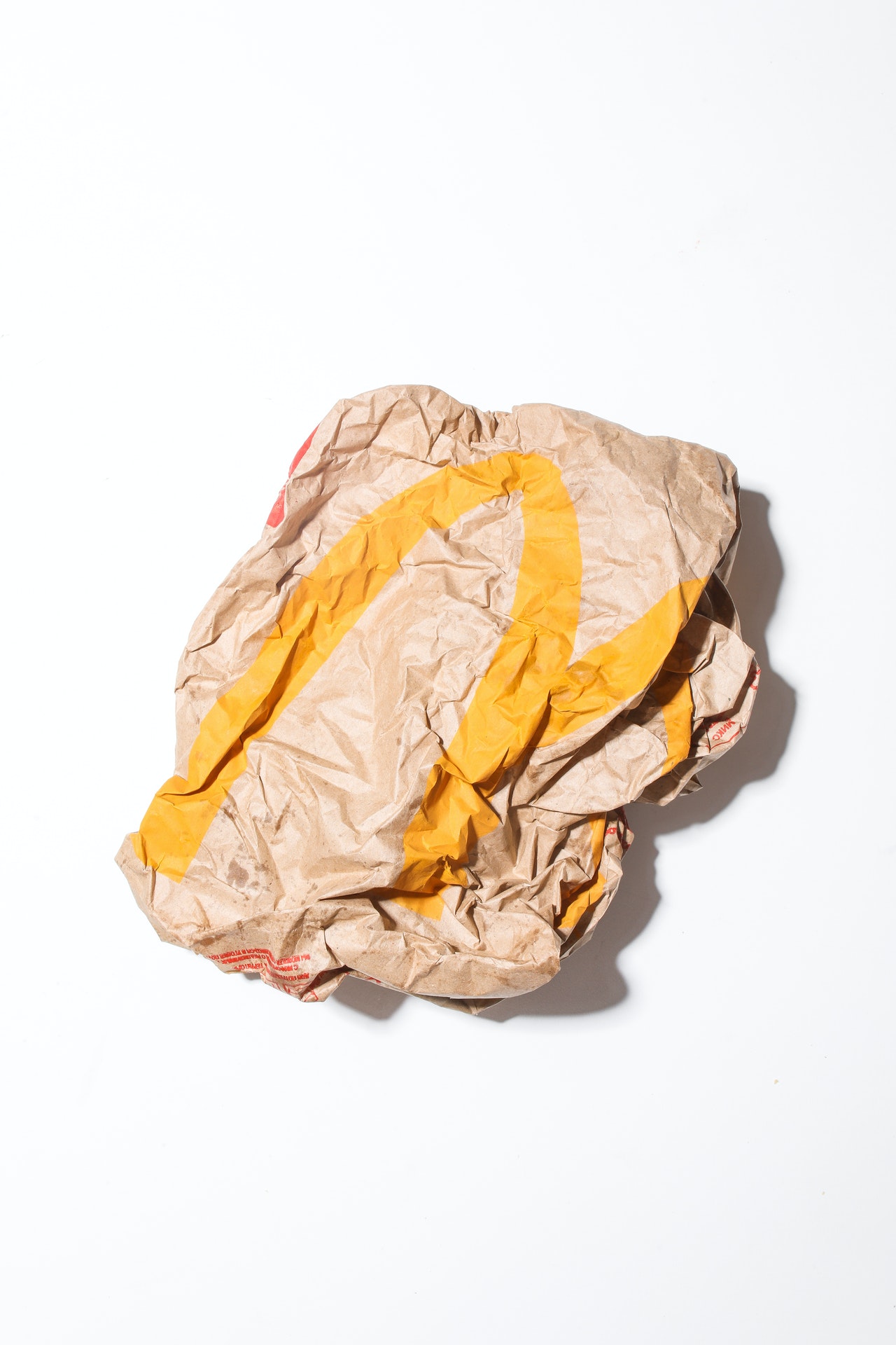 A crumpled up McDonald's bag